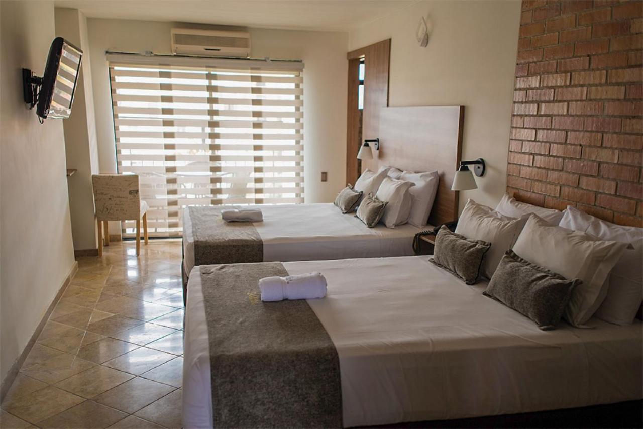 Hotel Cabo De La Vela Medellin Bagian luar foto